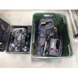 Box containing router, reciprocating saw, sander and jigsaw