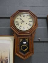 Wall clock in oak case