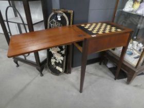 Converted sewing machine cabinet with chessboard surface