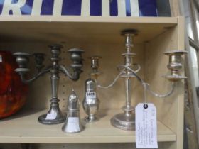 4 silver plated items to inc. 2 candleabra and 2 sugar shakers