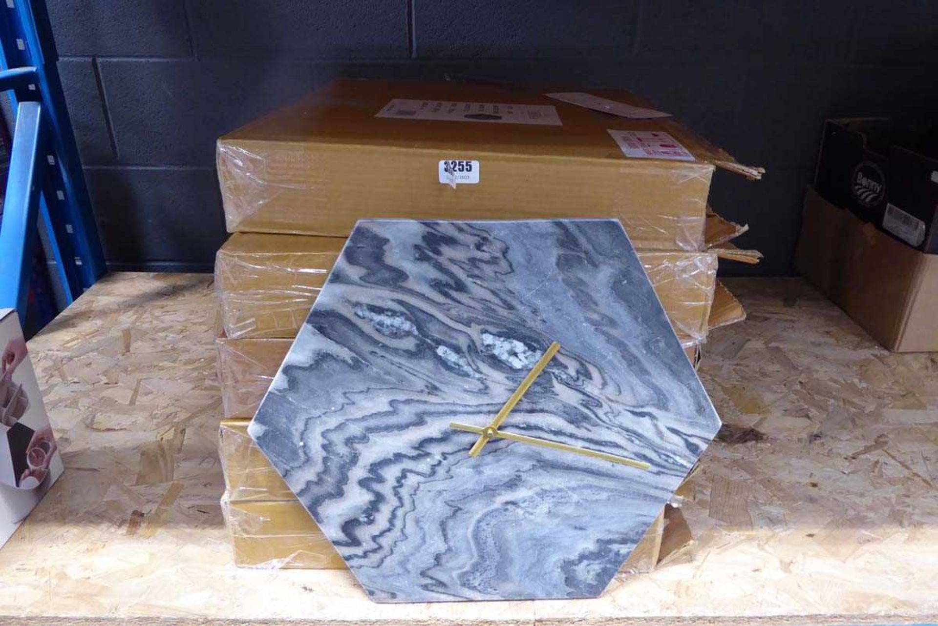5 boxed and 1 unboxed Libra marble wall clocks