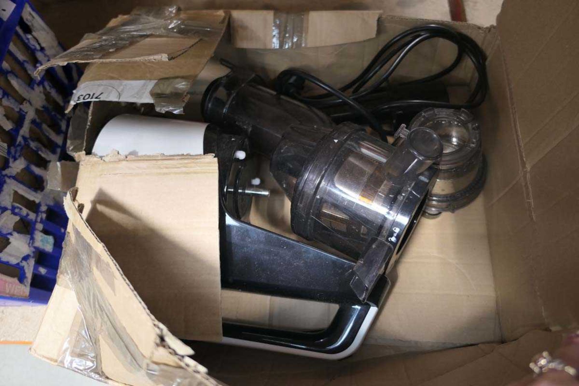 +VAT Box containing an unboxed juicer