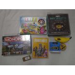 +VAT Selection of games to include Game of Life, Monopoly Salford edition, Fortnite trading cards,