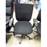 Black cloth swivel armchair