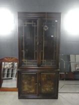 Chinese inspired display cabinet with cupboard under