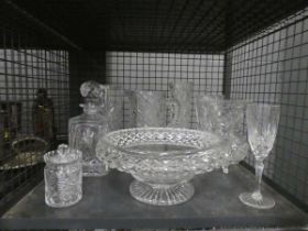 Cage containing glassware to include decanter, champagne flute, jug and various vases