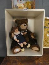 Steiff bear with a doll