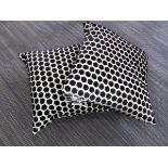 +VAT Pair of hexagonal patterned black and white scatter cushions