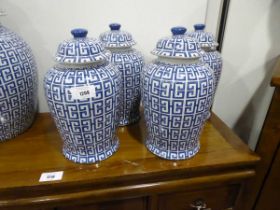 +VAT Set of 4 medium sized key design temple jars