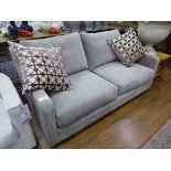 +VAT 2 seater sofa in grey material together with pair of brown patterned scatter cushions