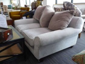 +VAT Two seater sofa in plain grey material with 3 similar coloured scatter cushions