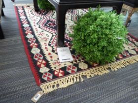 +VAT Black, red and cream geometric patterned rug