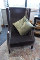 +VAT Grey wing arm chair with green scatter cushions