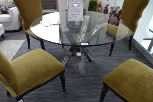 +VAT Circular glass topped and chromium based dining table