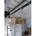 +VAT White floral metal 3 branch wall sconce together with a white 3 branch ceiling light fixture