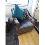 +VAT Chester button back armchair in graphite together with a turquoise loose cushion and a grey