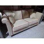 +VAT 2 seater sofa in oatmeal hessian material with red piping and 2 scatter cushions 200 x 94 x