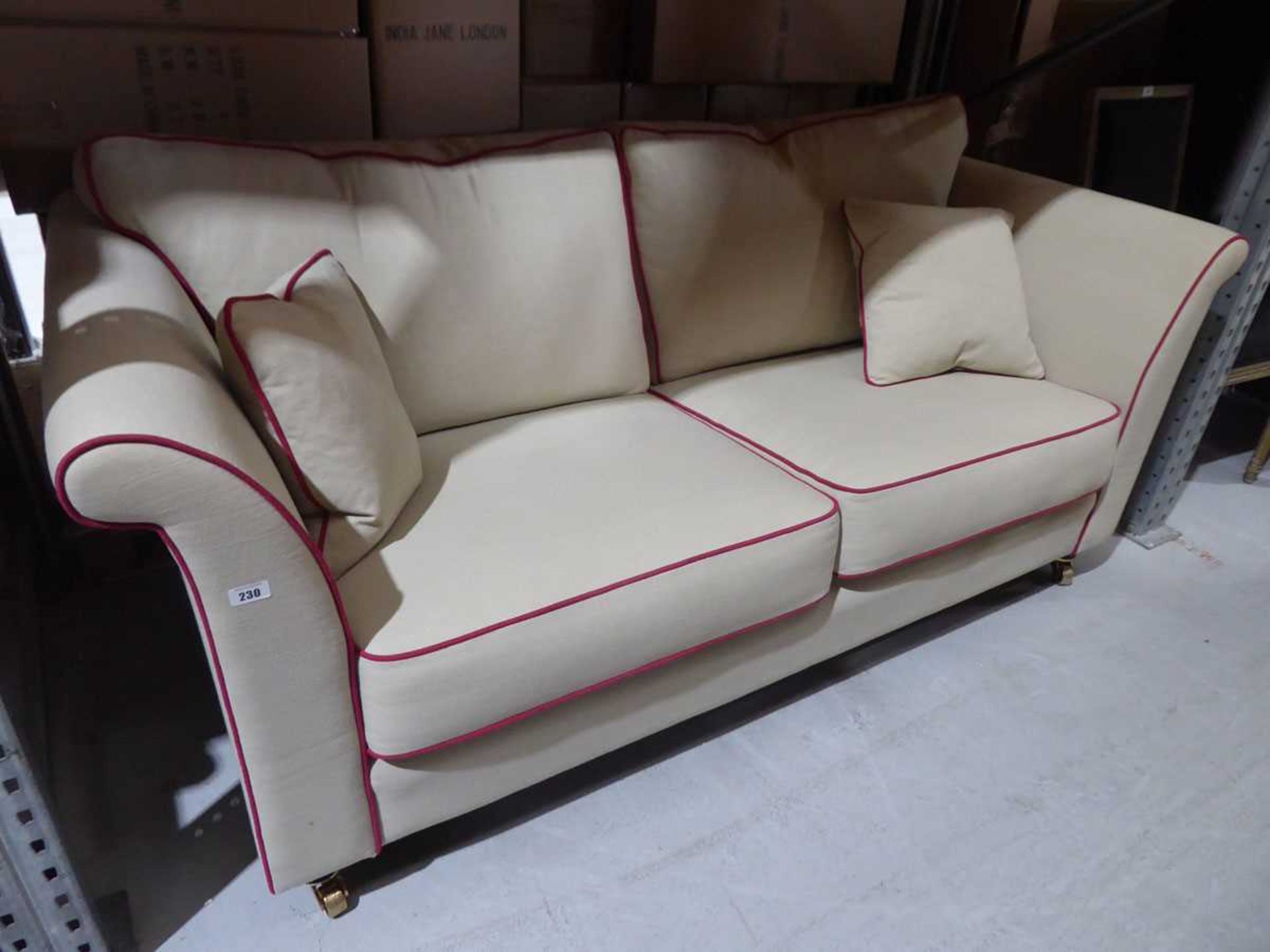 +VAT 2 seater sofa in oatmeal hessian material with red piping and 2 scatter cushions 200 x 94 x