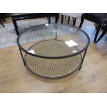 +VAT Circular black metal framed glass top and bergère effect coffee table