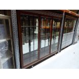 +VAT Victorian mahogany triple door shop display unit with some glass shelves and brass fittings,