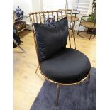 +VAT Copper effect metal easy chair with black cushions