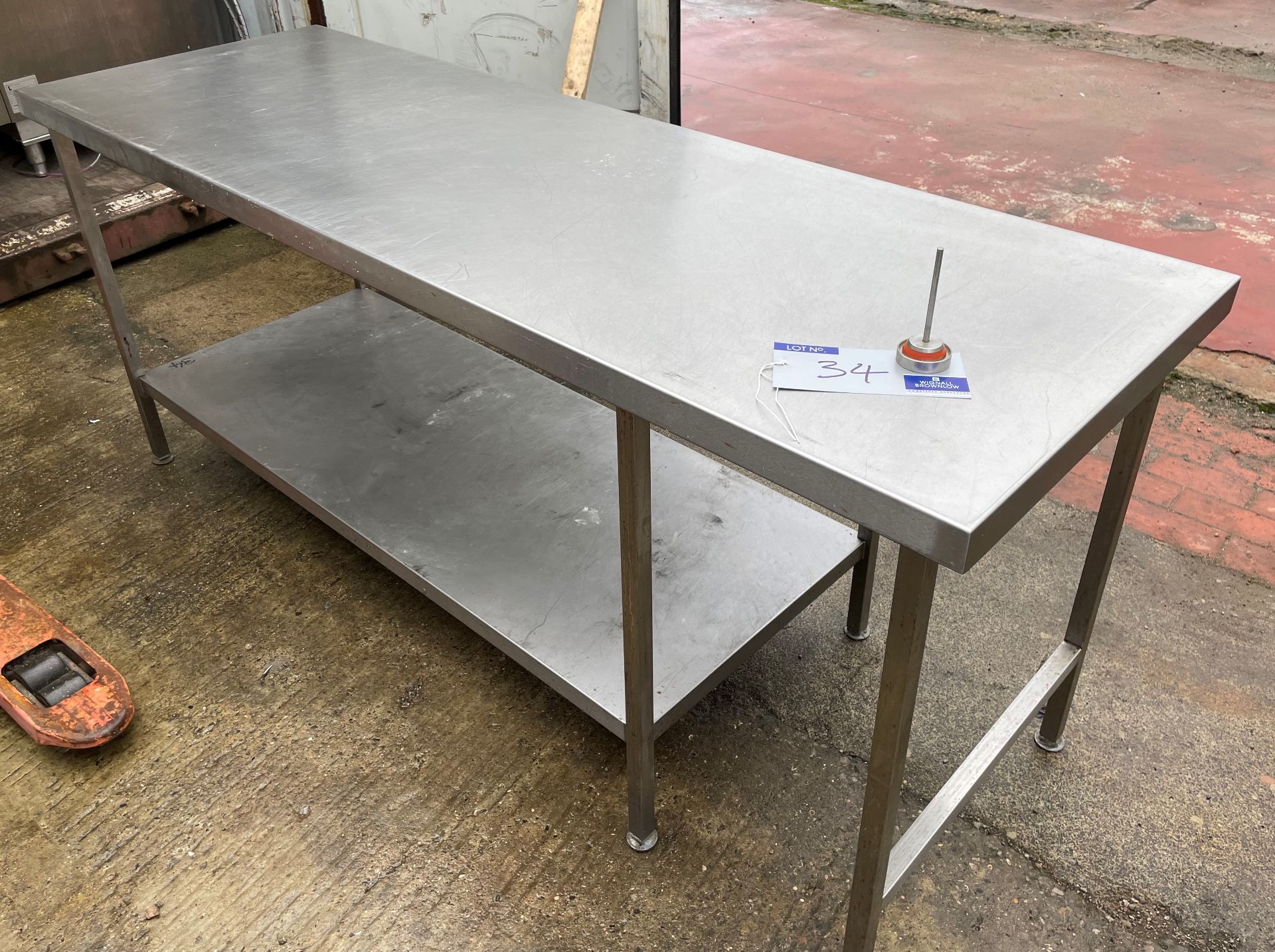 A Stainless Steel Food Preparation Bench, 210cm x 70cm x 90cm with undershelf (located at EMS