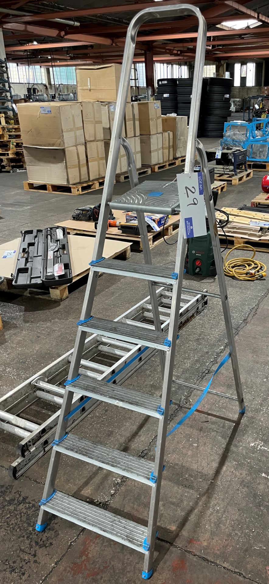 A MacAllister 6 rise Alloy Stepladder with Alloy 14 rise Double Extension Ladder.