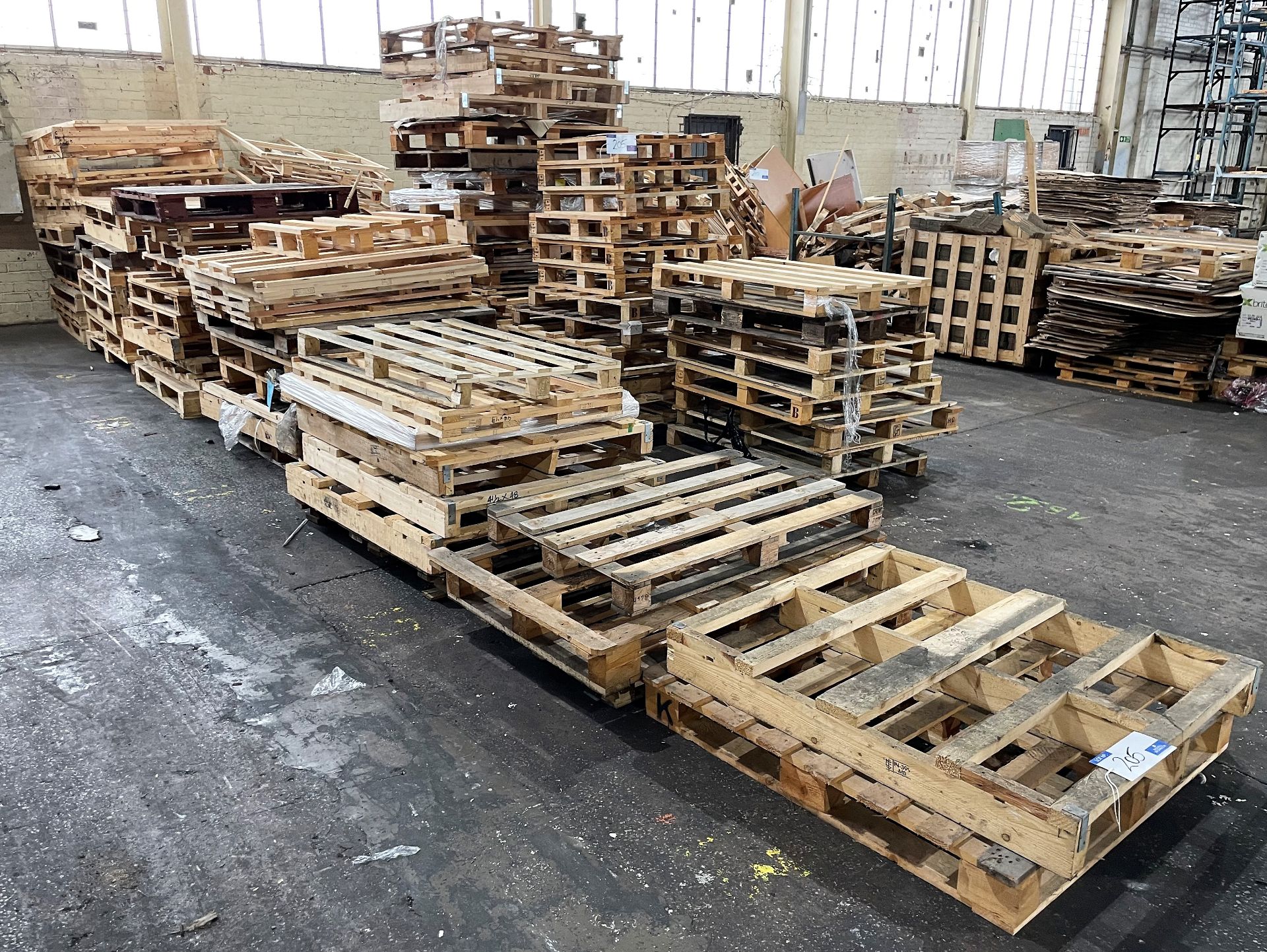 A Large Quantity of Assorted 2 way Timber Pallets.