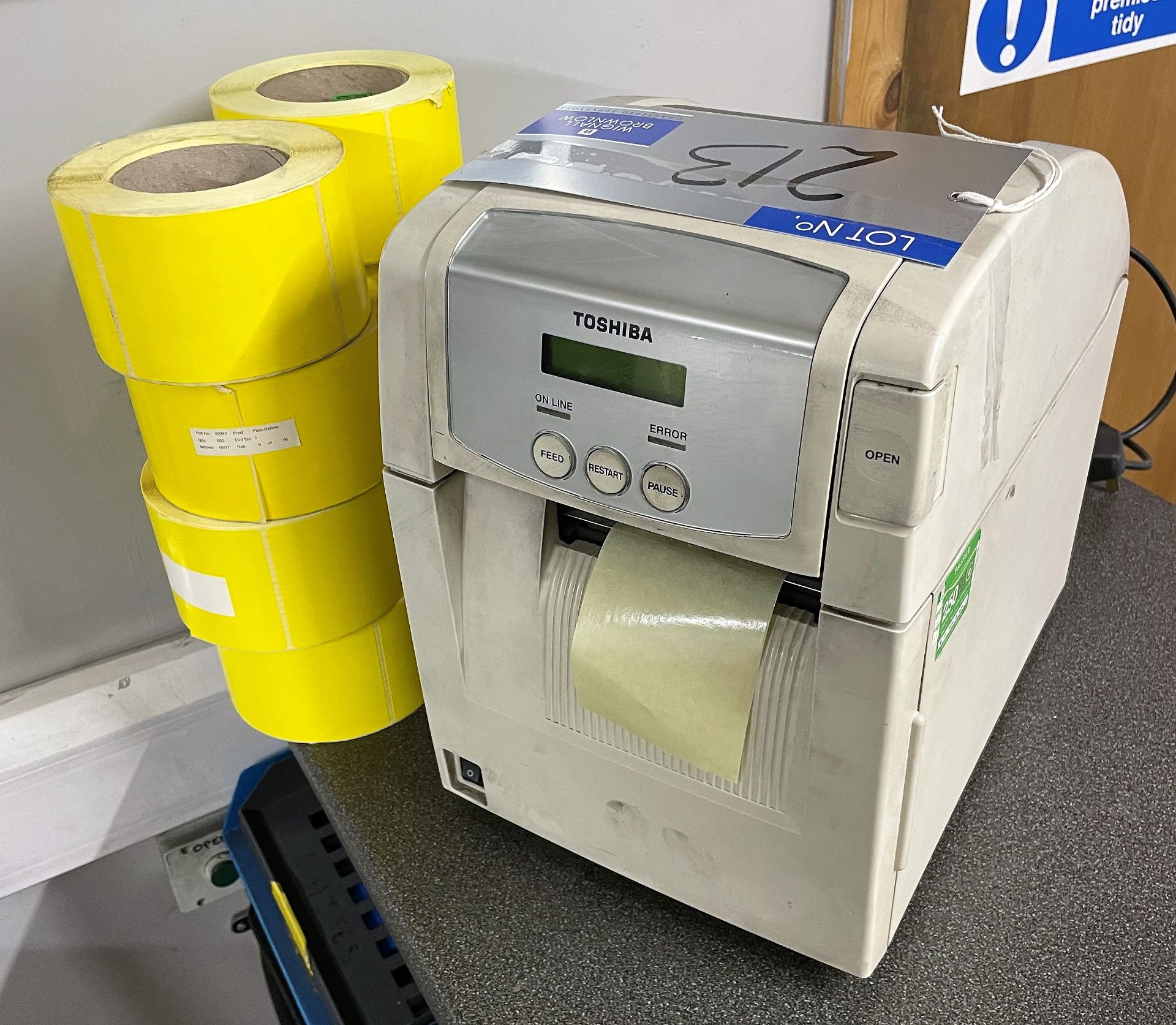 A Toshiba B-SA4TP-GS12-QM-R Bar Code Printer No.2607H560849 with labels.