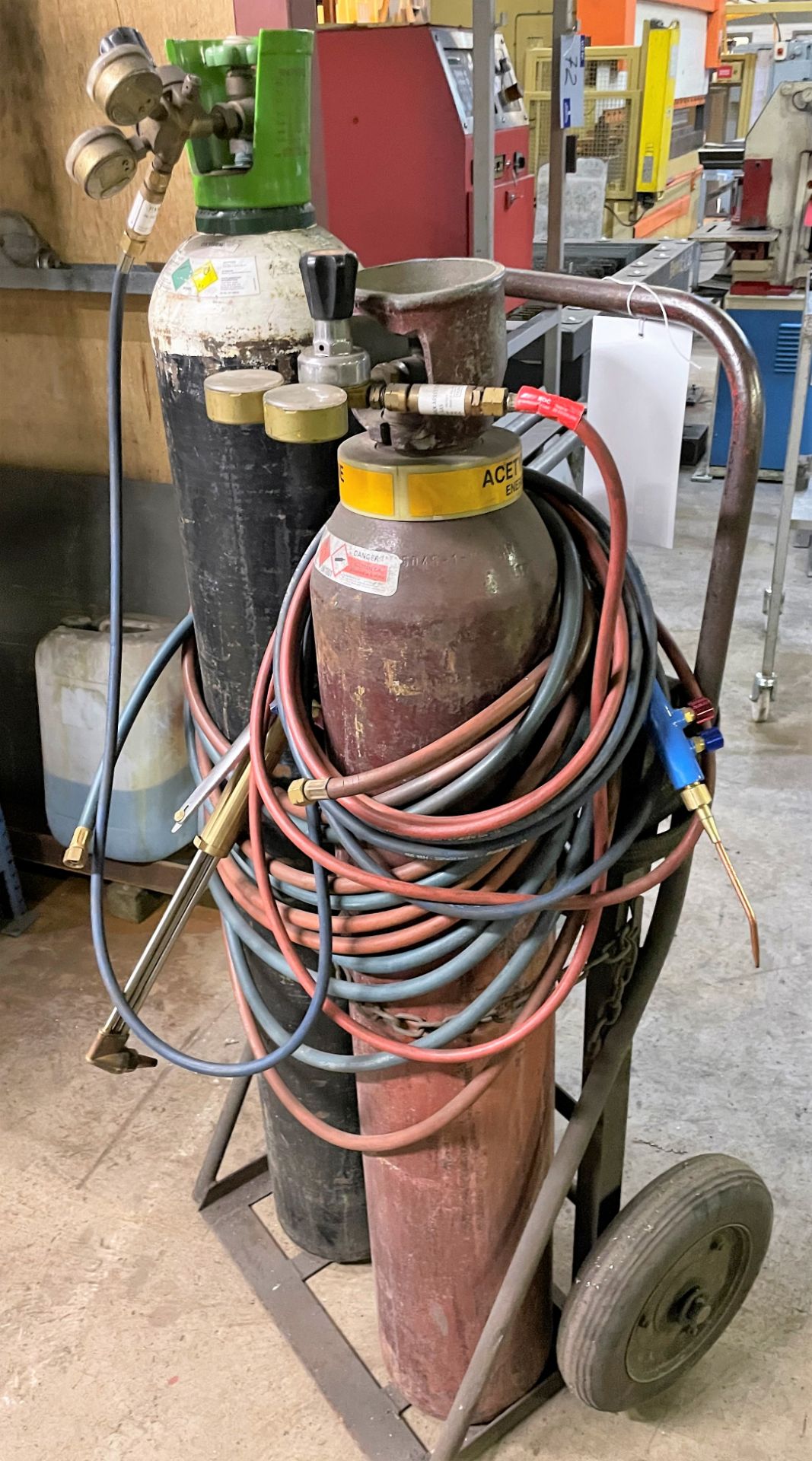 A Set of Oxyacetylene Cutting Gear with Gauges, Cutting Torch, Long and Short Hoses, Trolley.