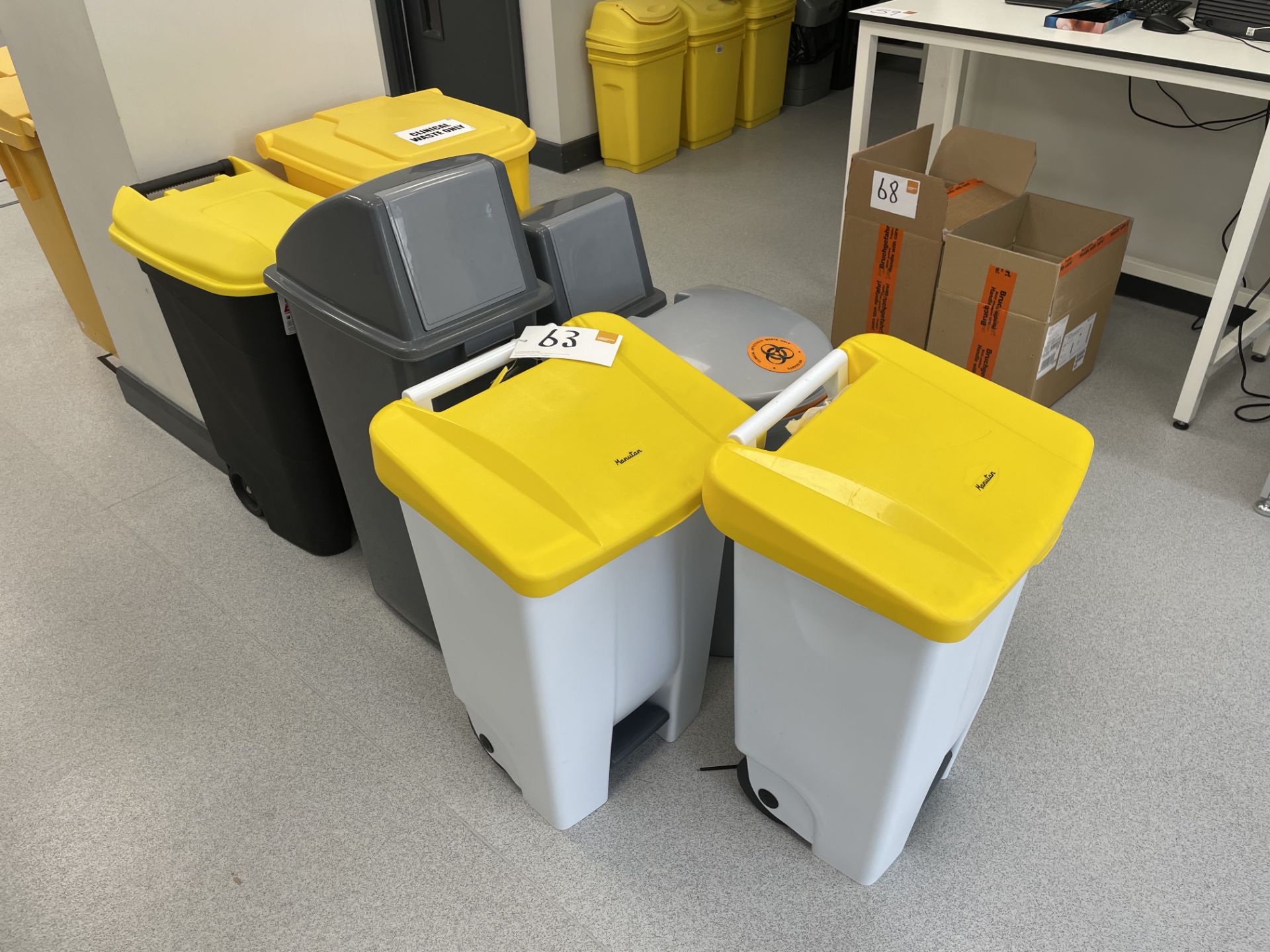 7 assorted clinical waste bins.