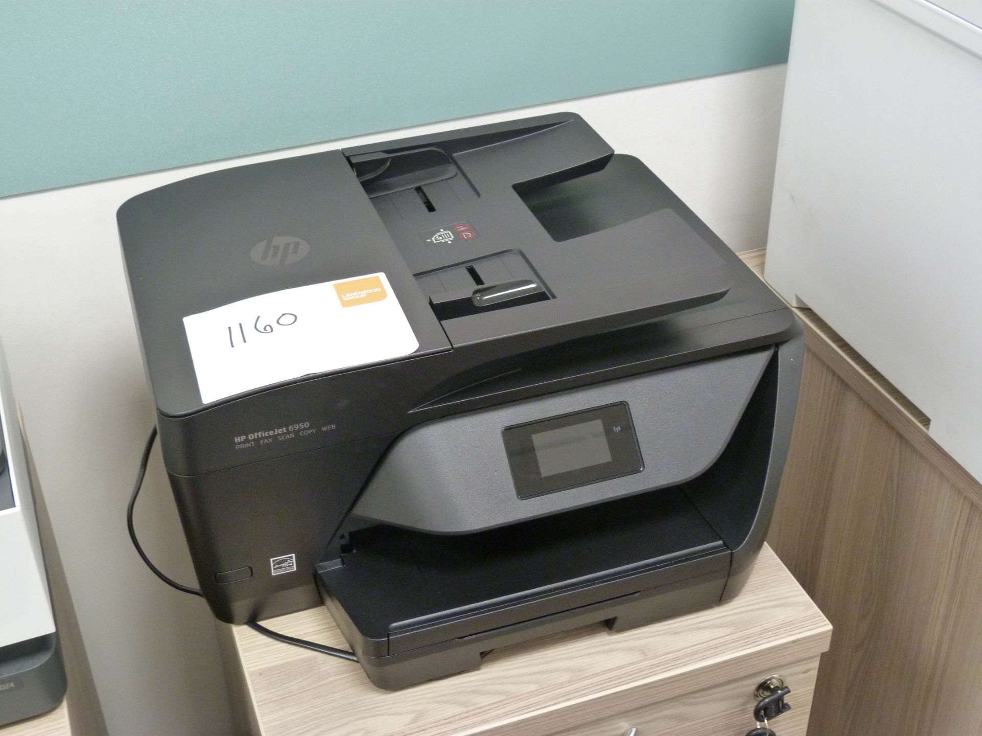 A HP OfficeJet Pro 6950 Multi Function Printer.