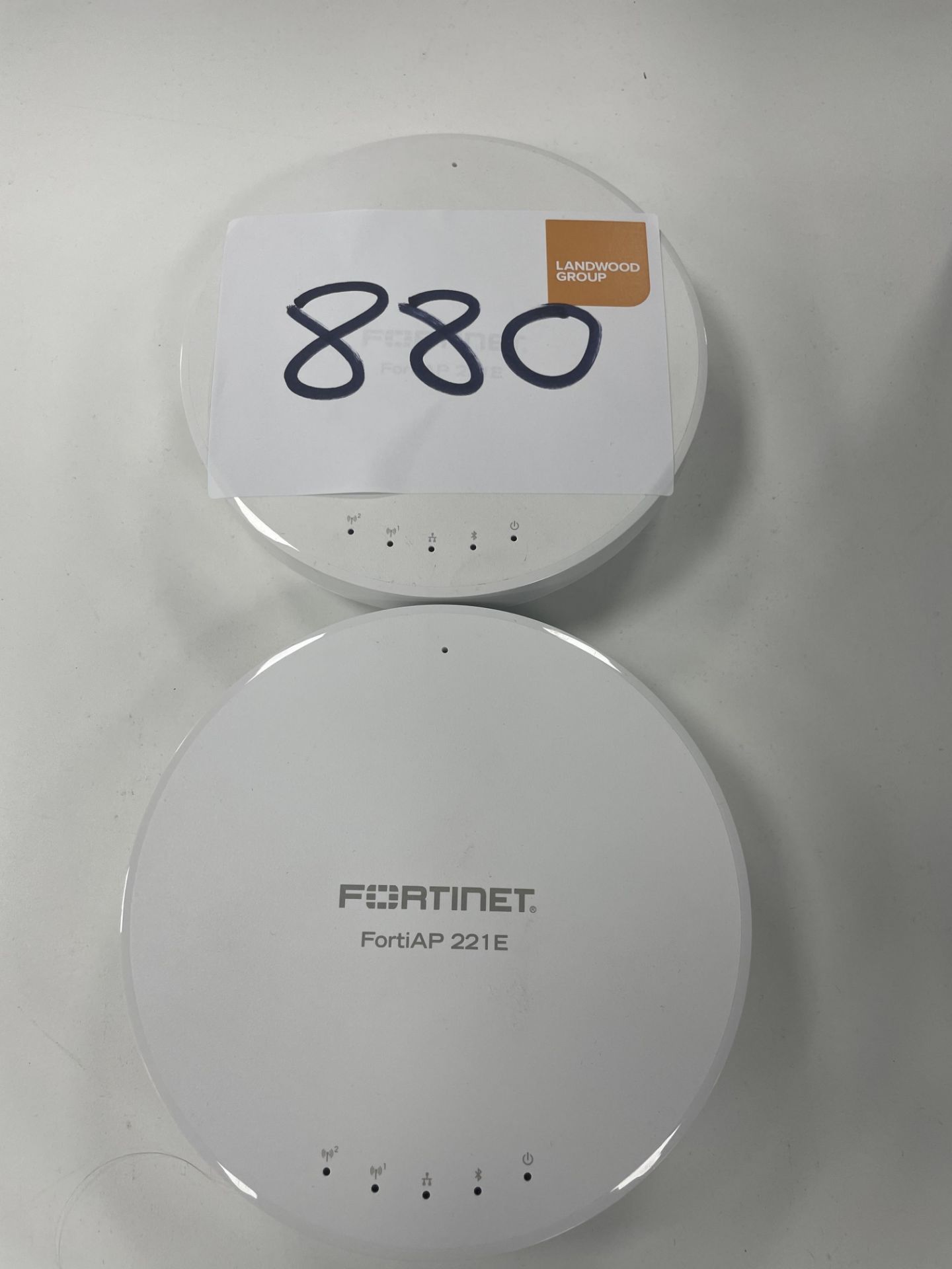 2 Fortinet FortiAP 221E indoor wireless dual band access points.