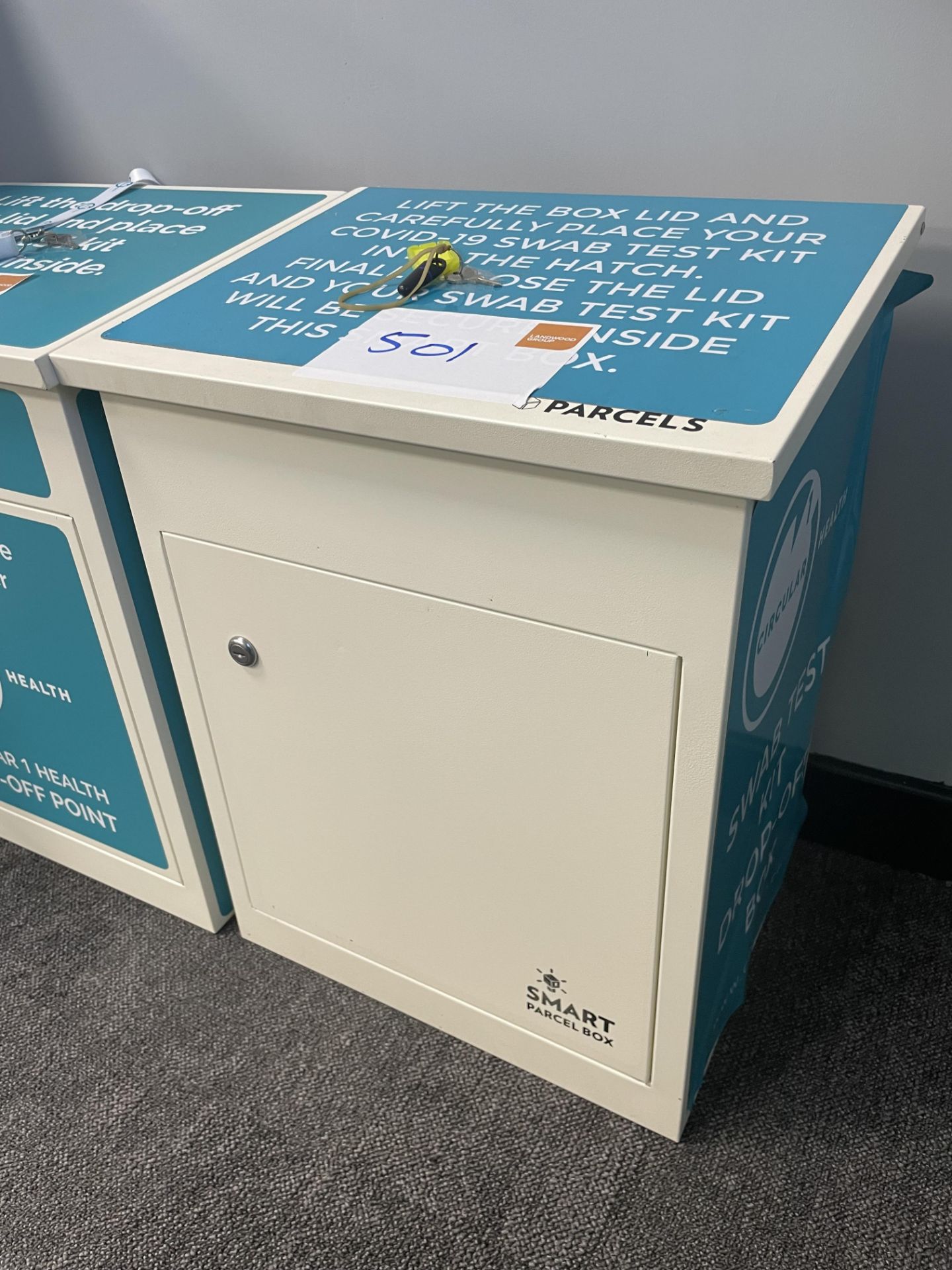 A Smart Parcel Box drop box with lifting lid and lock cabinet (key), white, 41cm x 33cm x 47cm h.