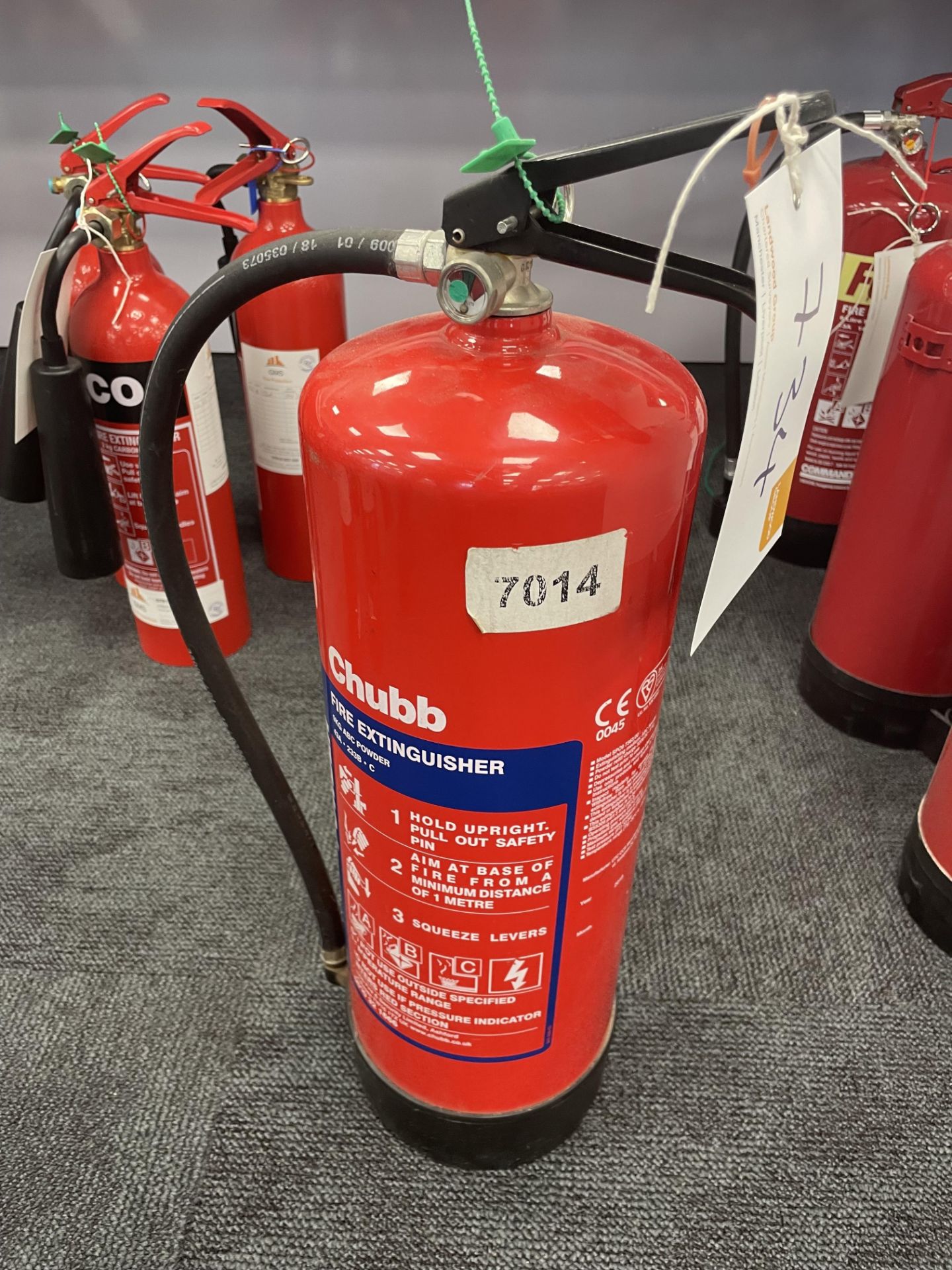 A Chubb 9kg powder fire extinguisher.