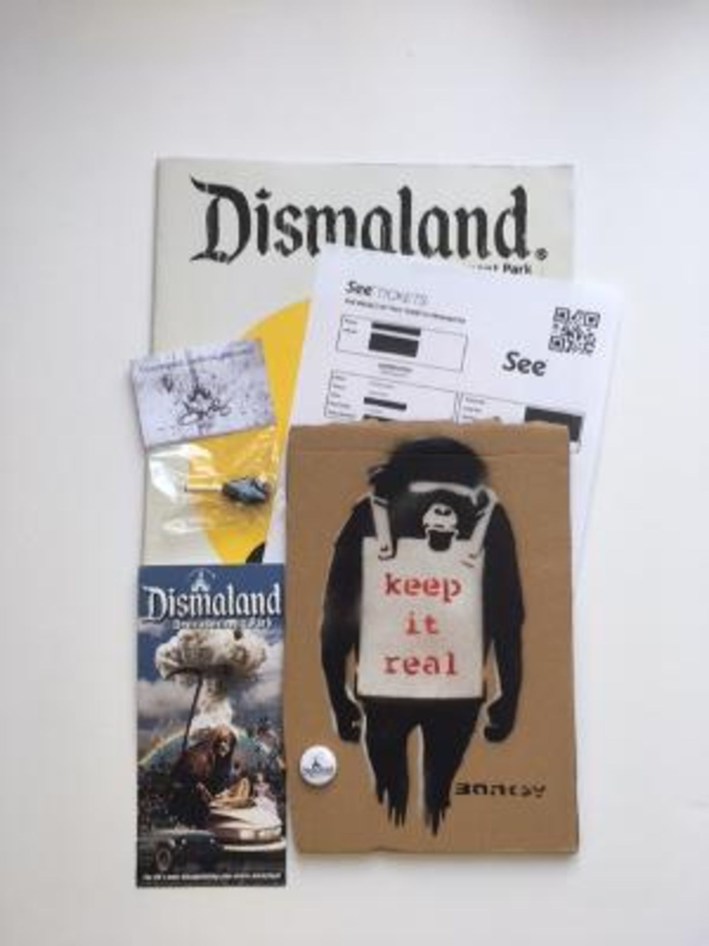 Six WSM Dismaland Bemusement Park Souvenirs including found Banksy ‘free art’ 2015 - Image 3 of 15