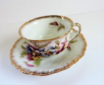 Vintage Hand Painted Porcelain Tea Cup and Saucer