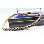 Gold on Sterling Silver Sapphire Tennis Bracelet set with 50 Sapphires