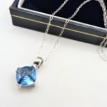 Sterling Silver Blue Topaz Pendant Necklace.