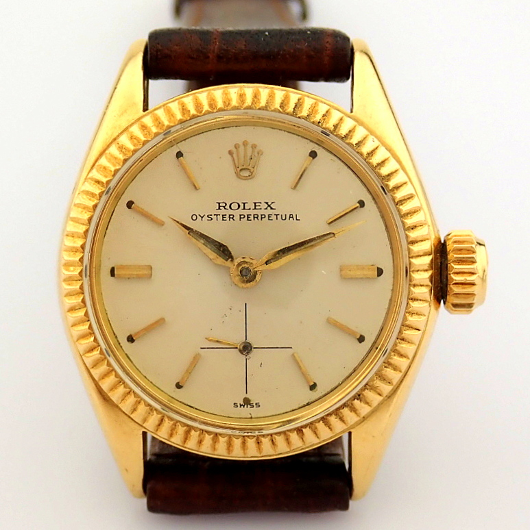 Rolex / Oyster Perpetual - Lady's Yellow Gold Wrist Watch