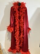 Red Feather Gown Worn By A Body Double