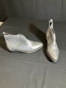 Hush Silver Boots Worn By A Body Double