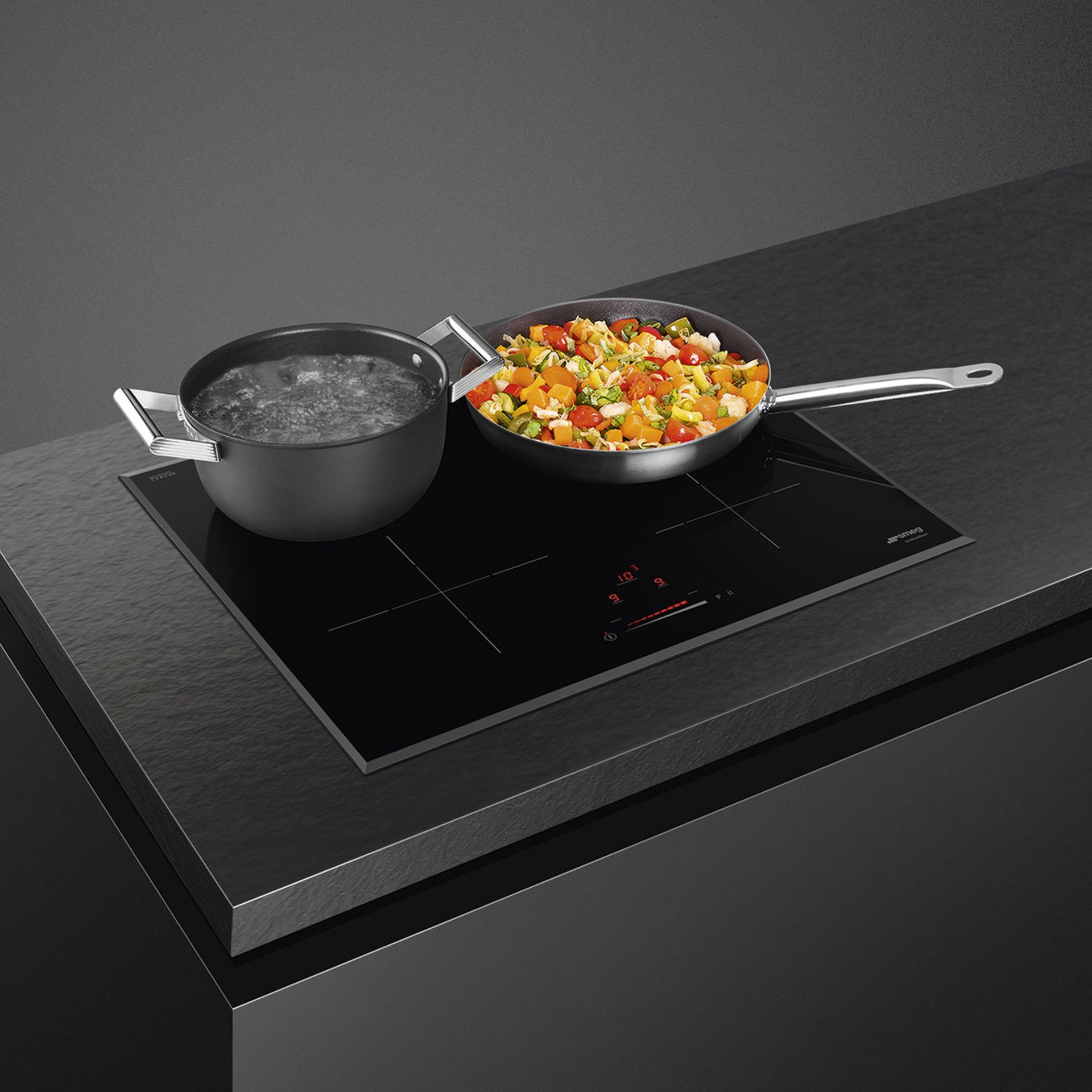 Current Online Price £549. Smeg Universal 4 Zone 60cm Induction Hob SI4642B.