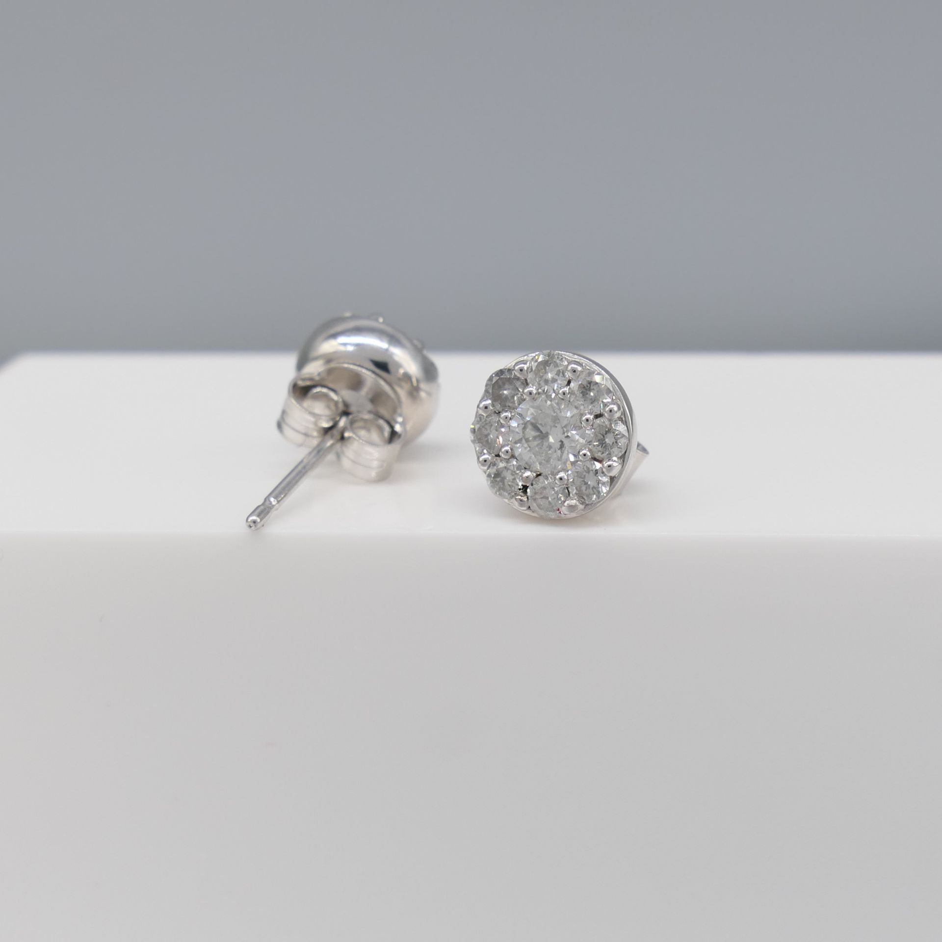 Pair of 9ct White Gold 0.71 Carat Diamond Halo Cluster Ear Studs, Boxed - Image 3 of 6