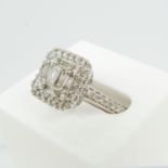 White Gold Dress Ring Set With 1.02 Carats Diamonds In Baguette and Round Brilliant Cuts