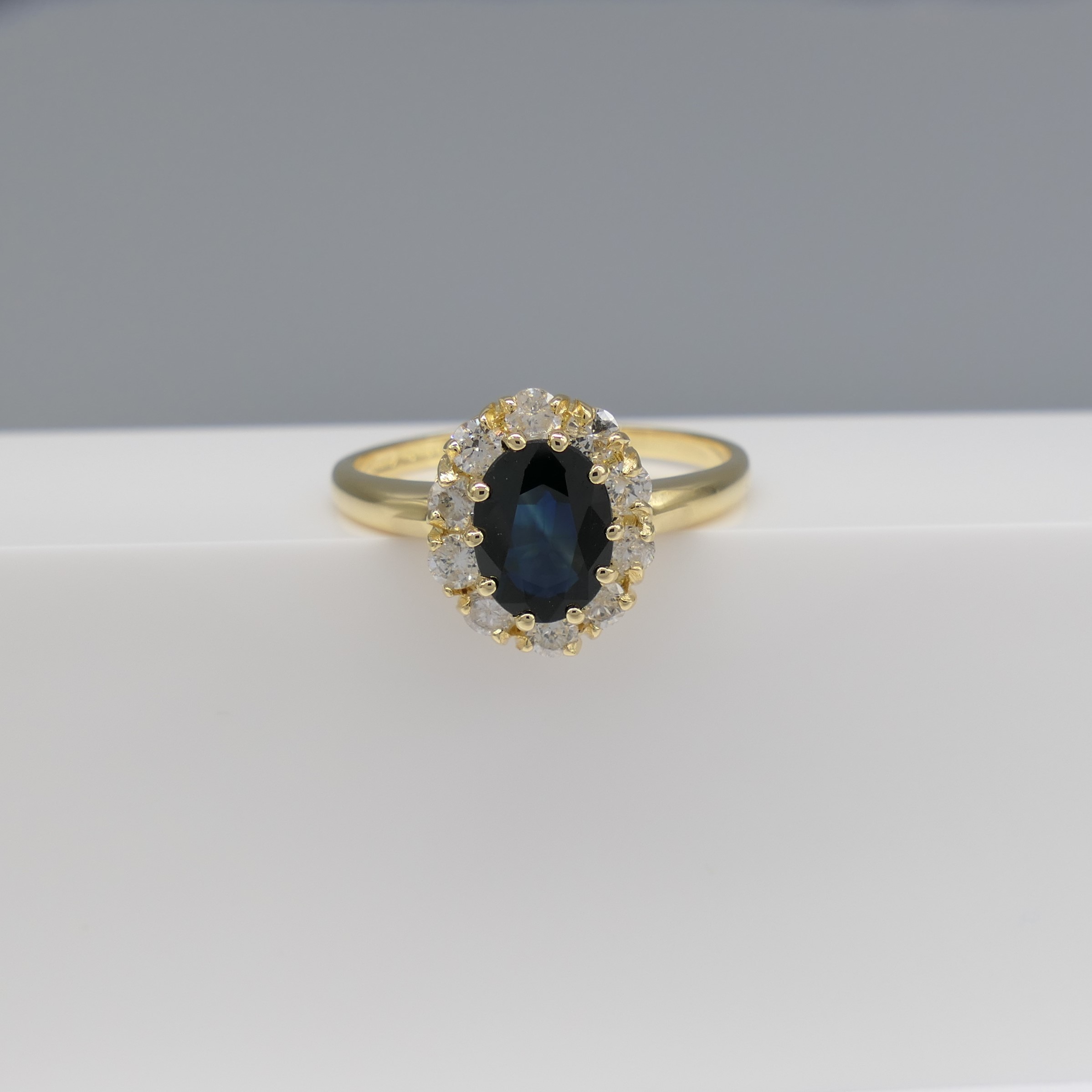 Oval-cut Sapphire and Round Brilliant-cut Diamond Cluster Ring In 18ct Yellow Gold - Image 2 of 6