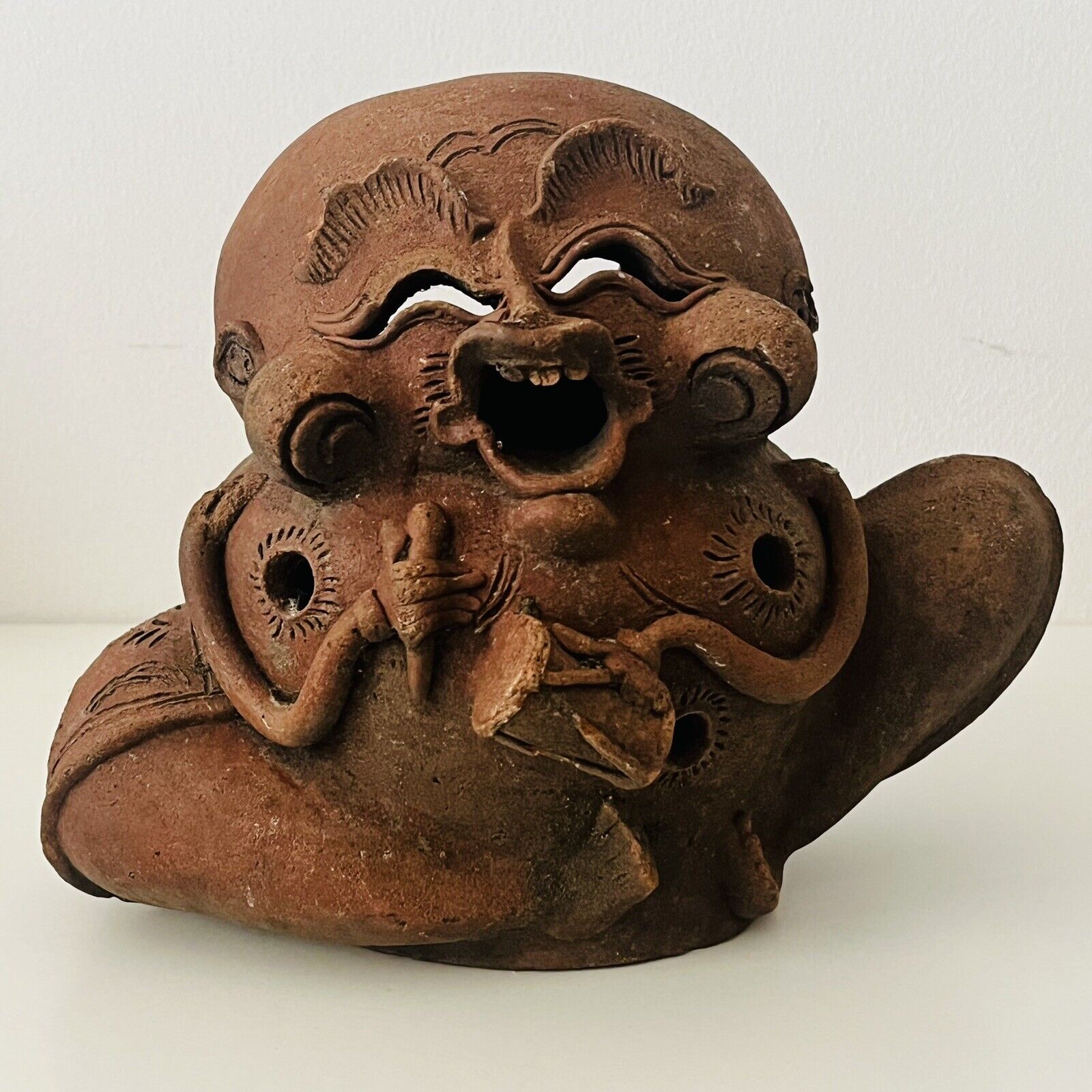 An Unusual Vintage Terracotta Candle Holder Or Figurine of A Laughing Buddha