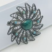 An Antique Israeli Silver Filigree Brooch with Turquoise and Green Stones