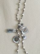 Boutique Rice/ Seed Pearl Necklace With Mother of Pearl Tassle