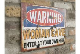 Woman Cave Sign